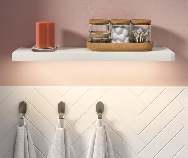 A glass cork SAXBORGA jar with lid and tray in the bathroom