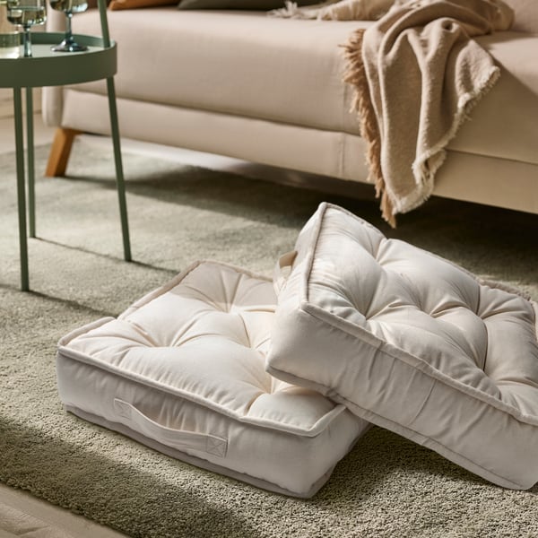 An unbleached GURLI floor cushion