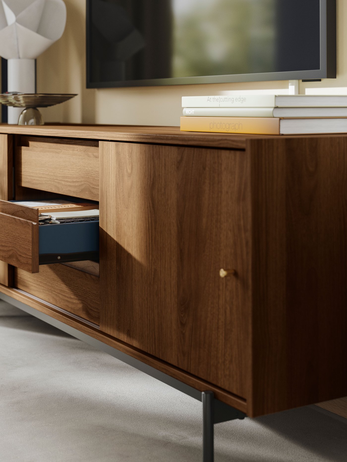 A brown walnut effect RÅDMANSÖ TV bench