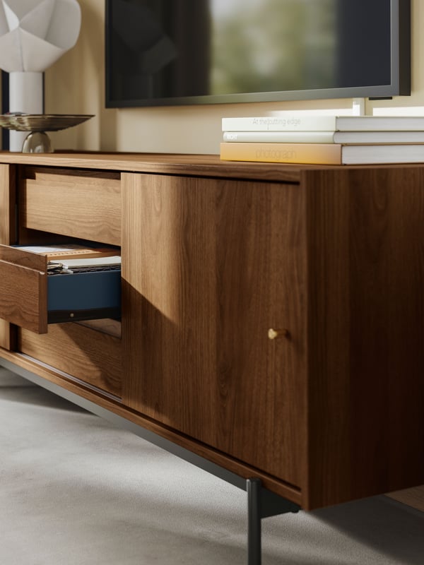 A brown walnut effect RÅDMANSÖ TV bench