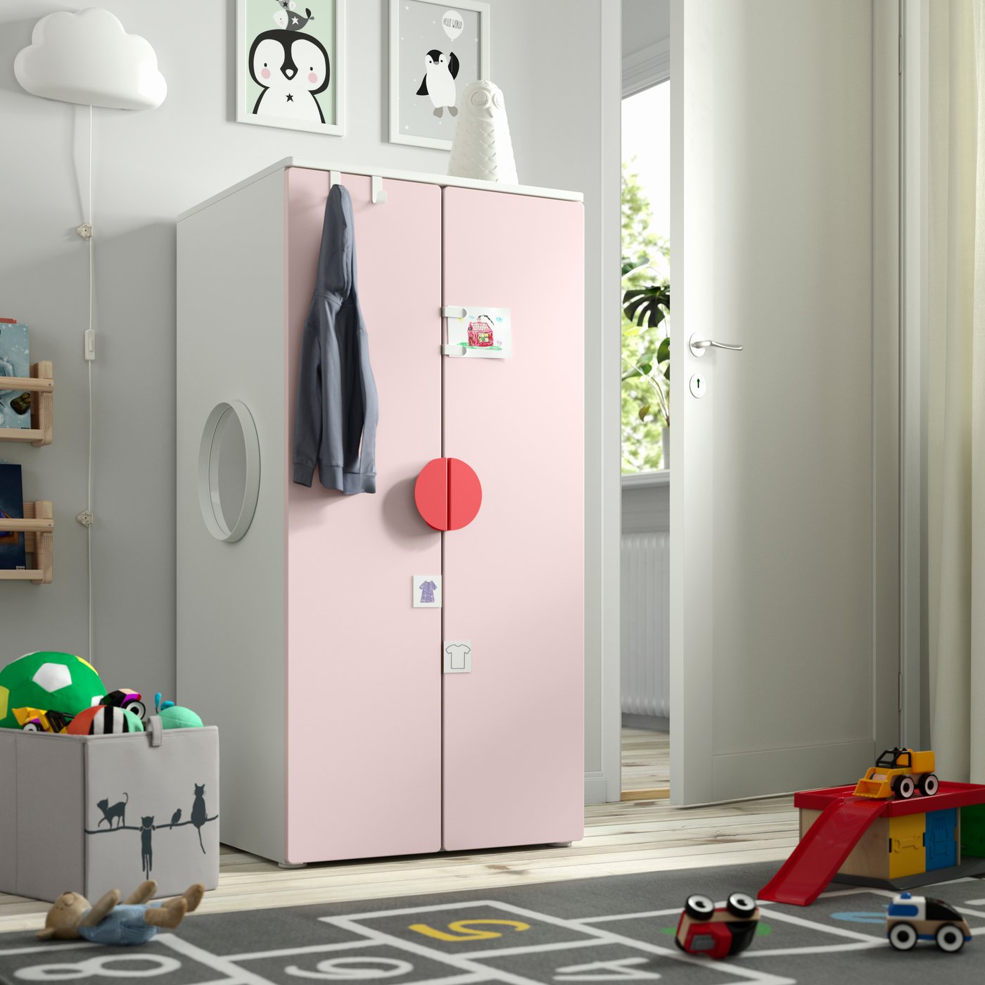 A white pale pink/with 3 shelves PLATSA wardrobe in the childrens room
