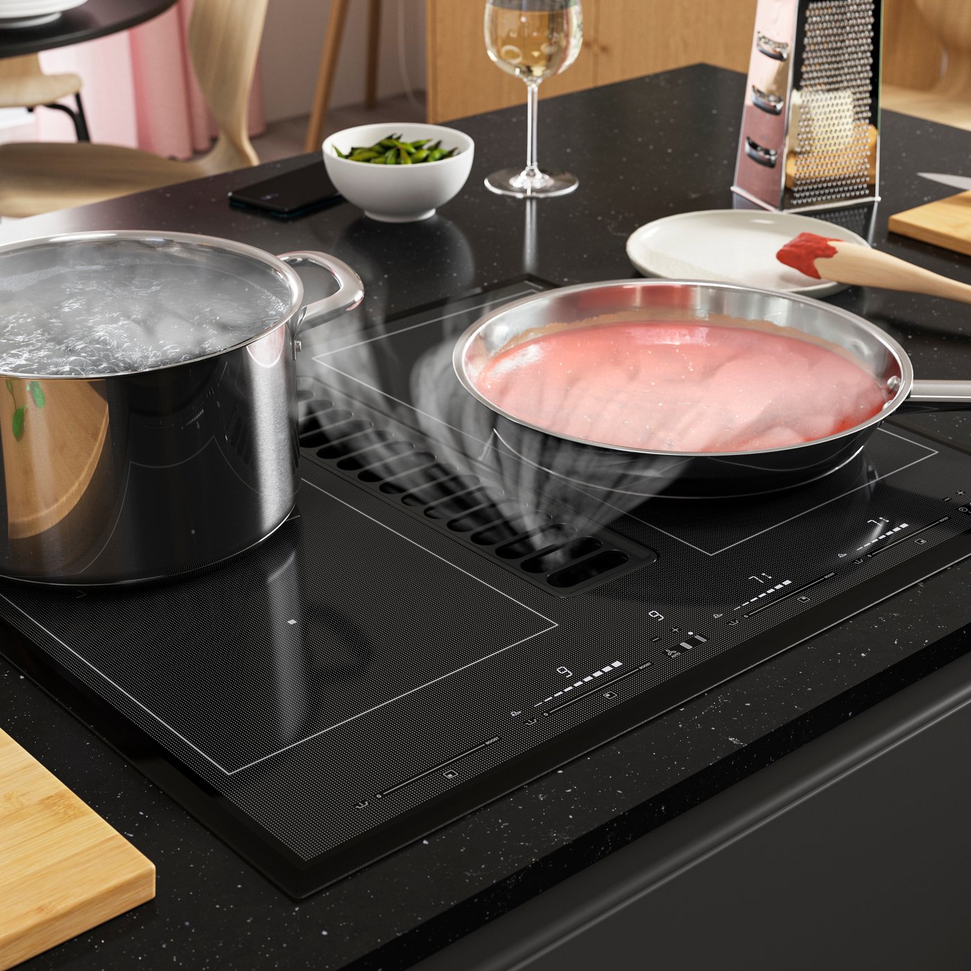 An IKEA 500/black TÄCKNAN ind hob/int extractor w recirc kit in the kitchen
