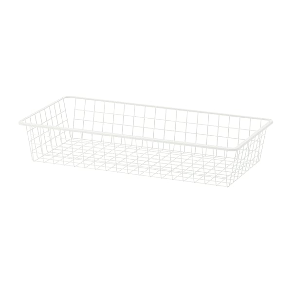 A white HJÄLPA wire basket in the NA