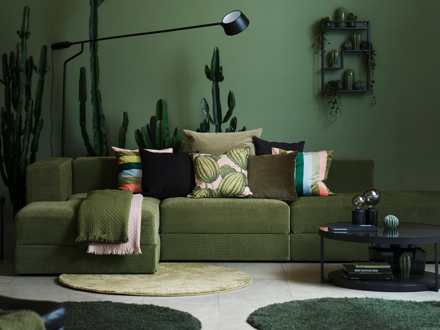 JÄTTEBO modular sofa in modern green setup with low coffee table