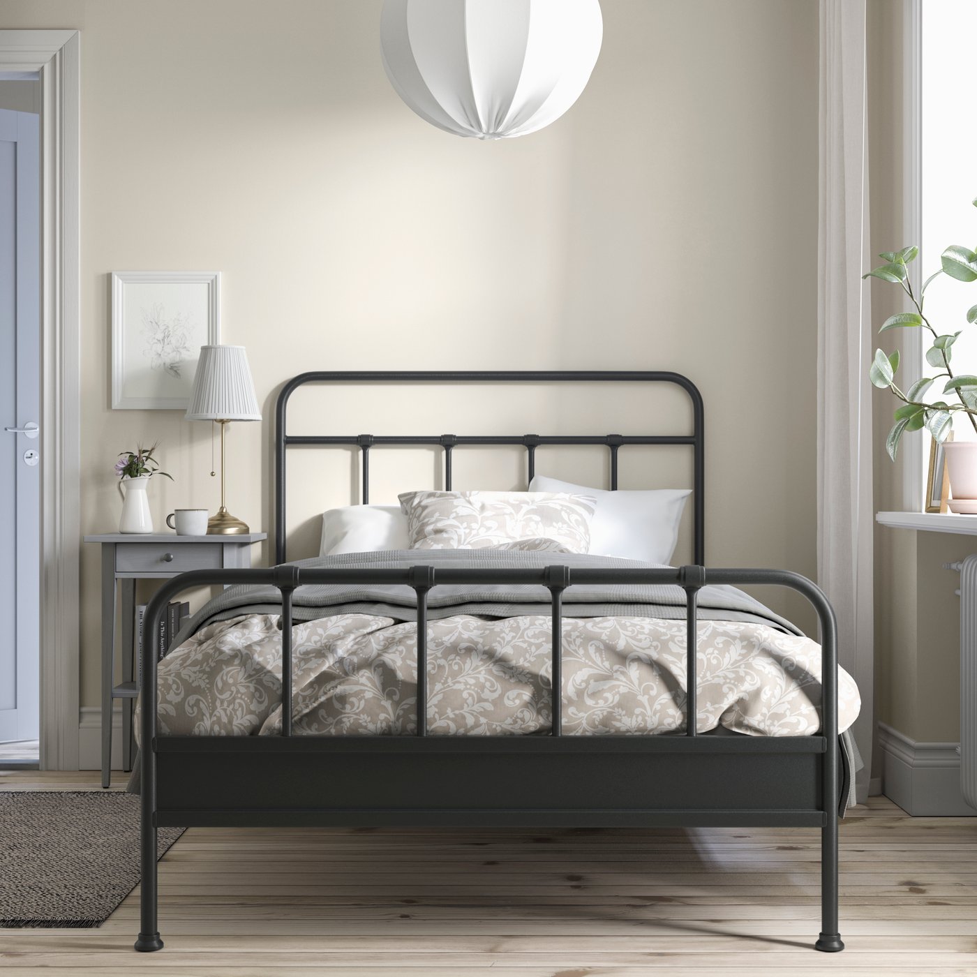 An anthracite STJÄRNÖ bed frame