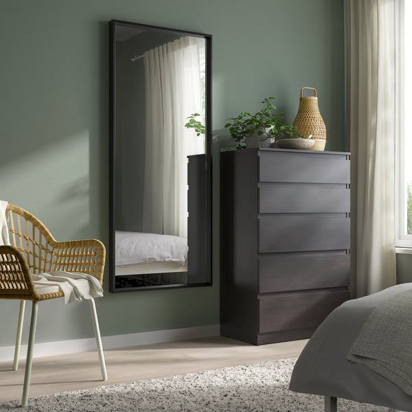 A black NISSEDAL mirror