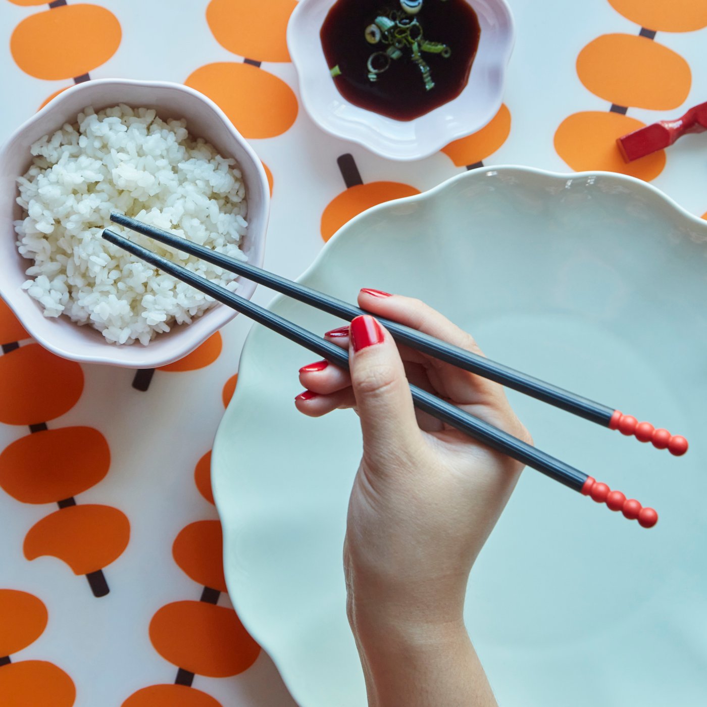 A red FÖSSTA chopsticks 4 pairs