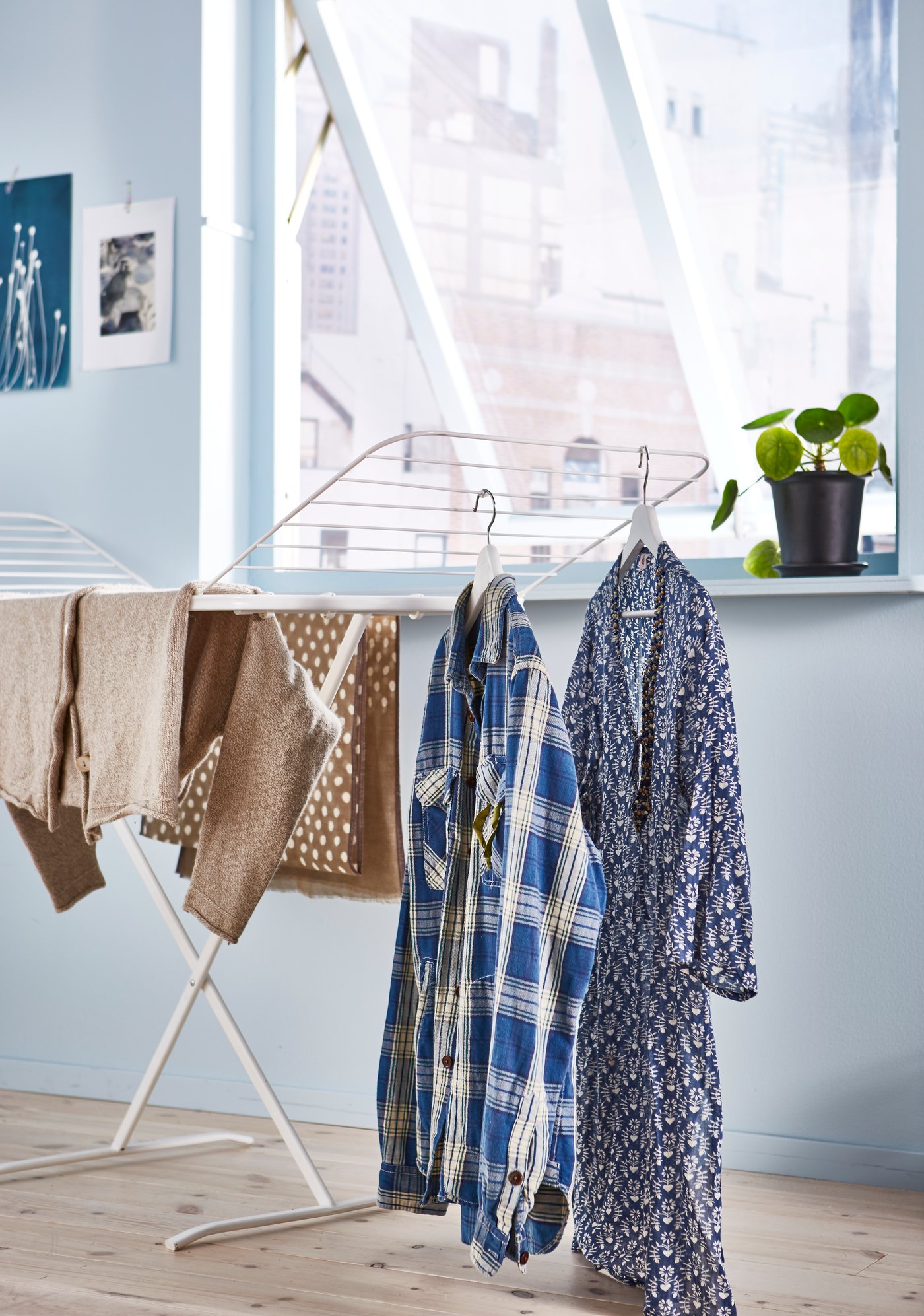 A white MULIG drying rack, in/outdoor