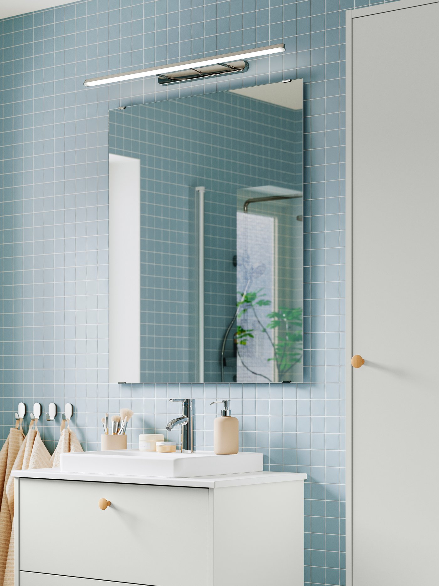 A chrome-plated FLASKPOST LED cabinet/wall lighting