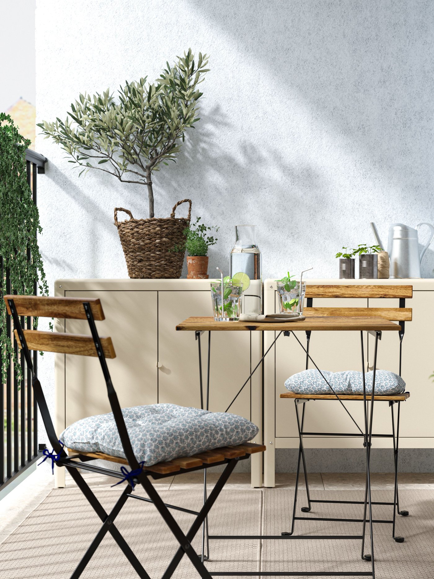 A black/light brown stained TÄRNÖ table+2 chairs, outdoor