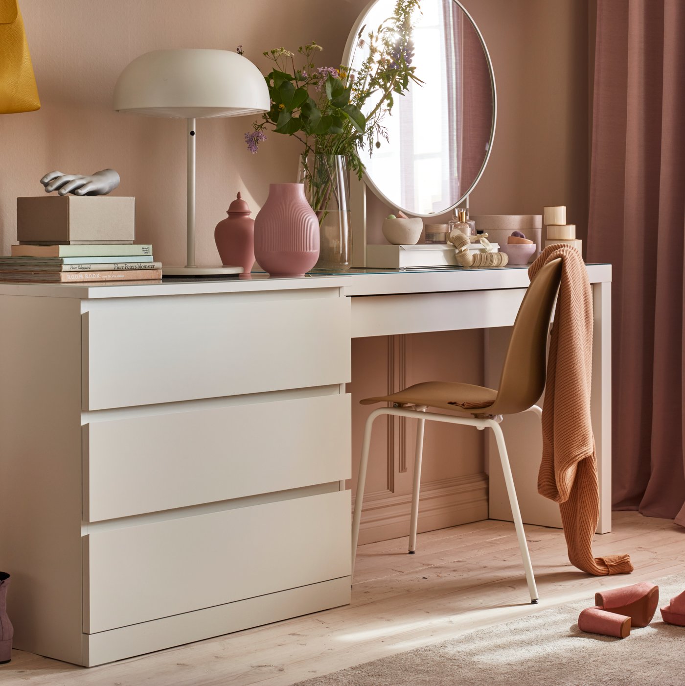 A white MALM dressing table in the bedroom