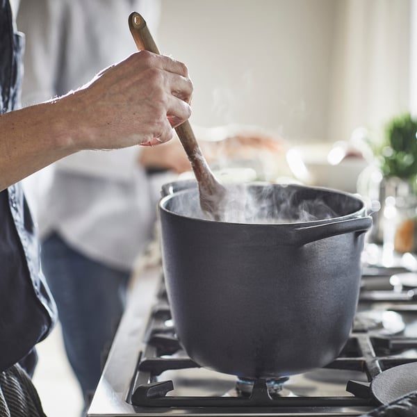 An enamelled cast iron matt/black VARDAGEN pot with lid