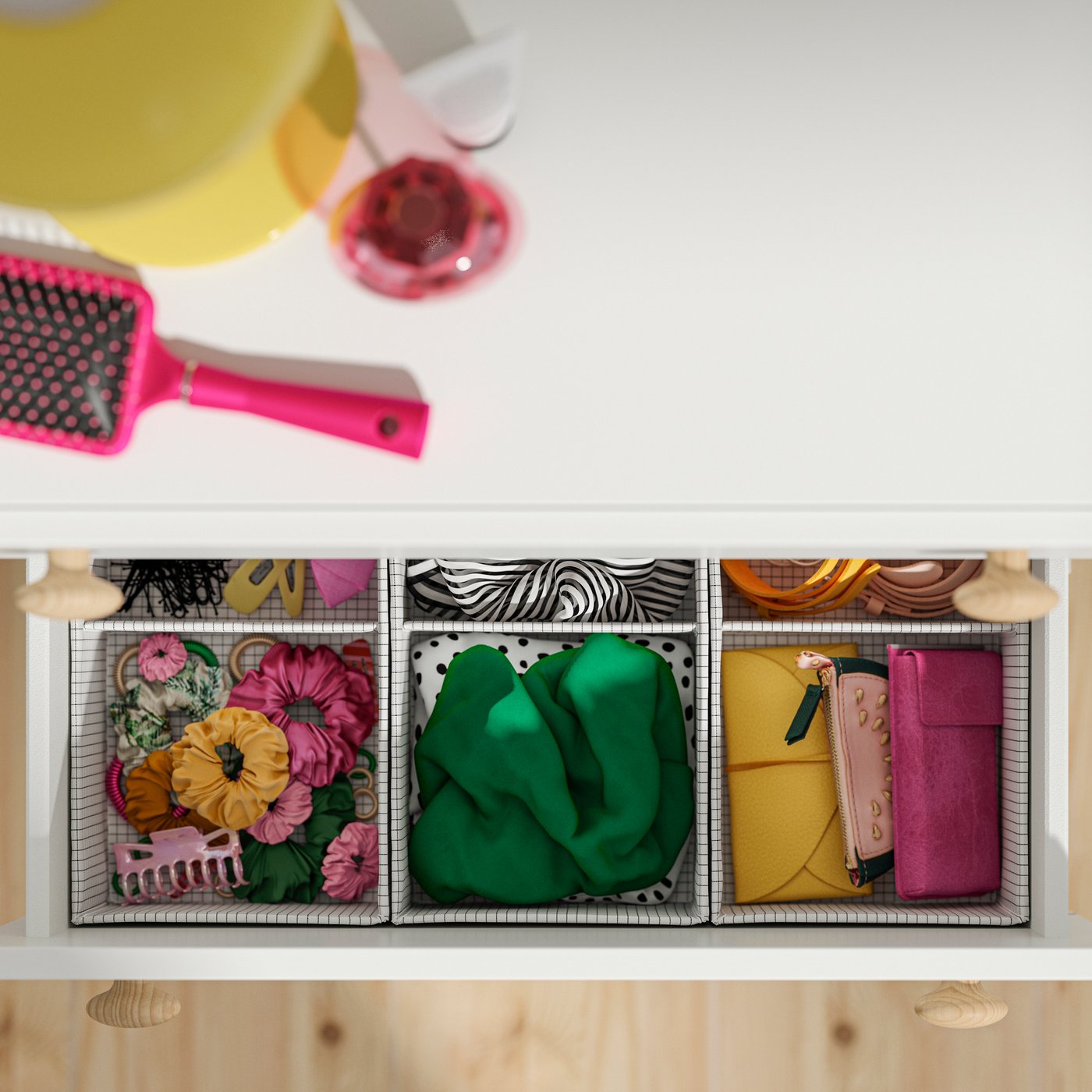 STUK organisers inside a LASTARE storage furniture piece.