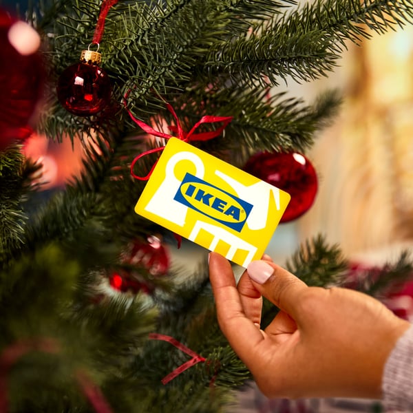 An IKEA Gift card set up in a Christmas tree