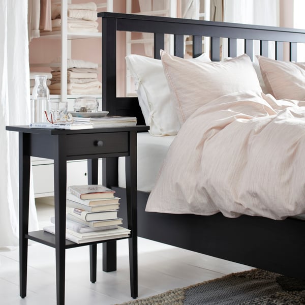 A black-brown HEMNES bedside table