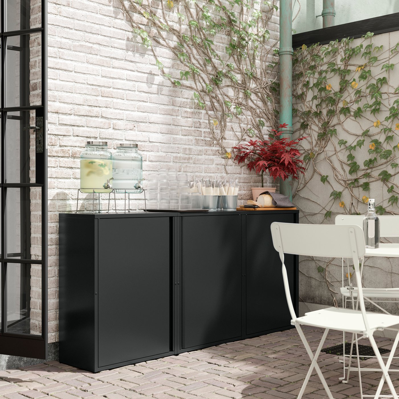 An anthracite outdoor/indoor  SUNDSÖ cabinet outside