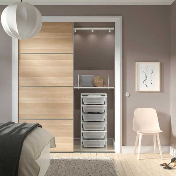 A white JONAXEL storage combination