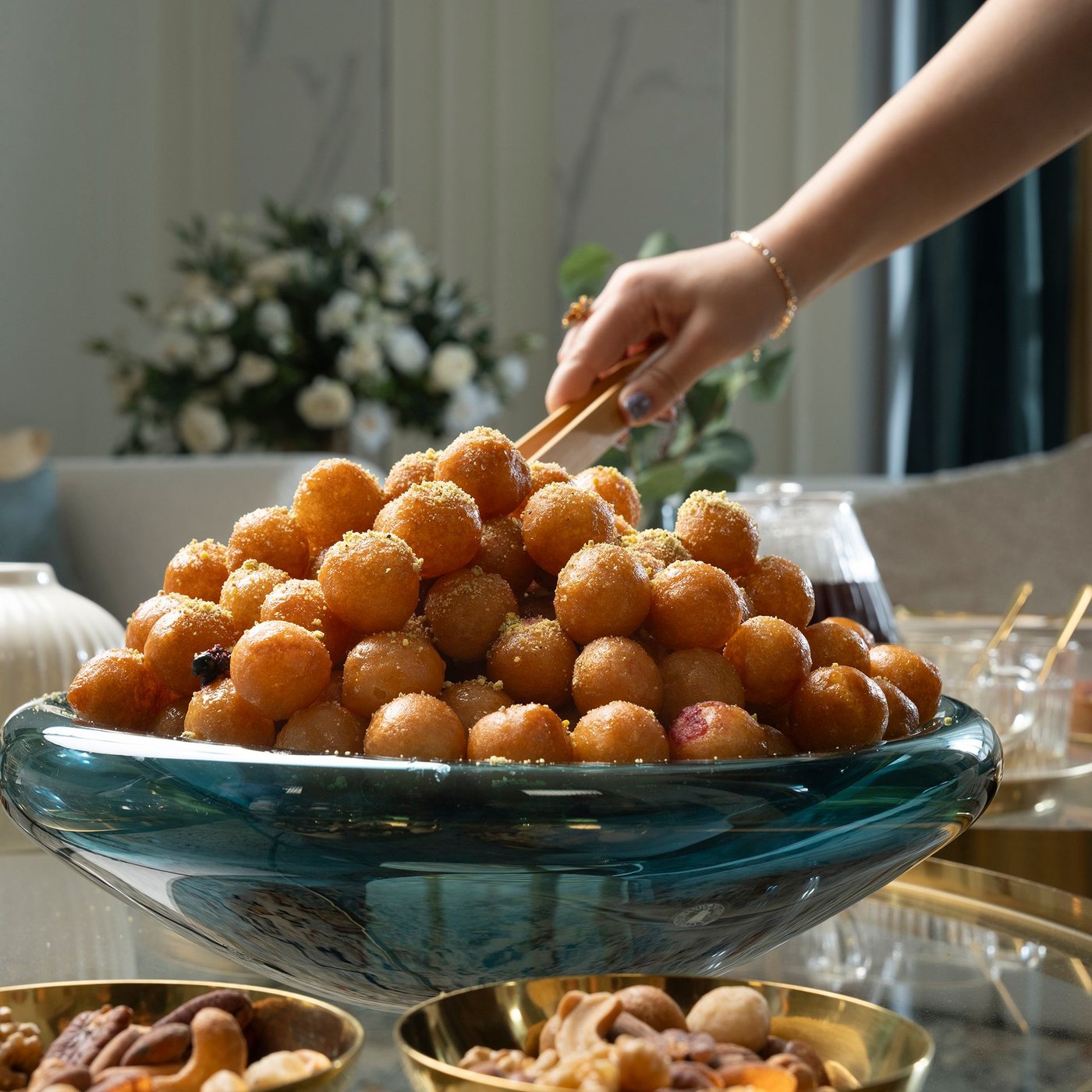 A gold effect/glass TORSJÖ coffee table