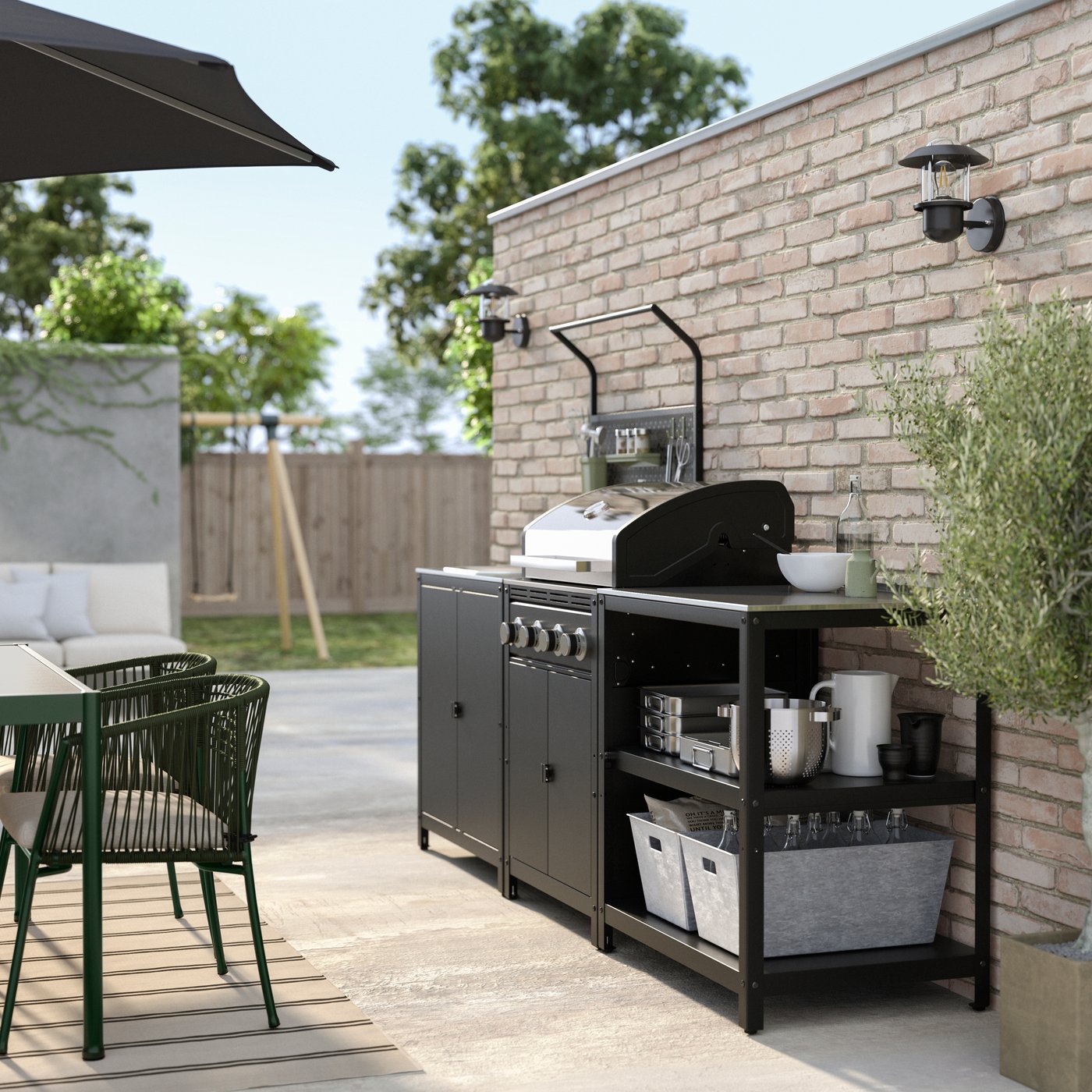 A stainless steel GRILLSKÄR outdoor kitchen w gas barbecue