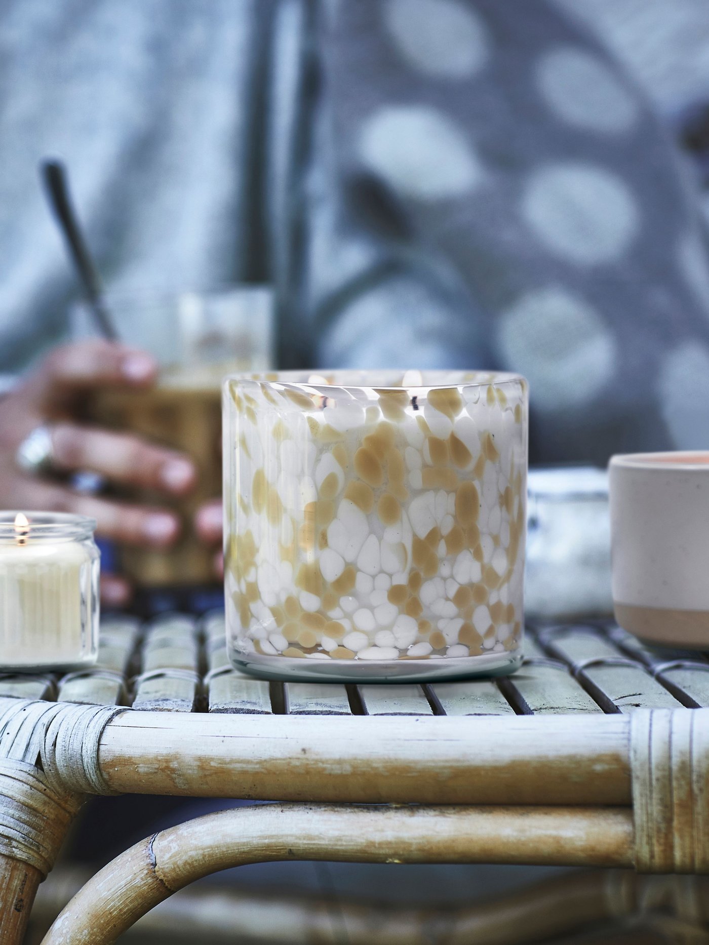 A Vanilla/light grey-beige JÄMLIK scented candle in glass, 2 wicks