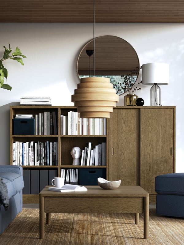 A brown stained oak veneer TONSTAD storage combination