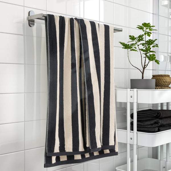 A black/light beige striped SLÅNHÖSTMAL bath sheet