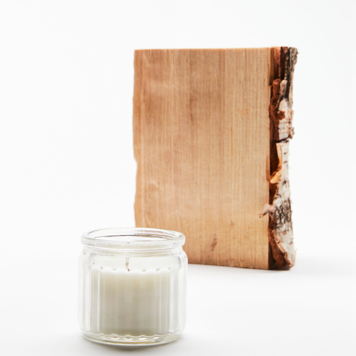 A Scandinavian Woods/white ADLAD scented candle in glass