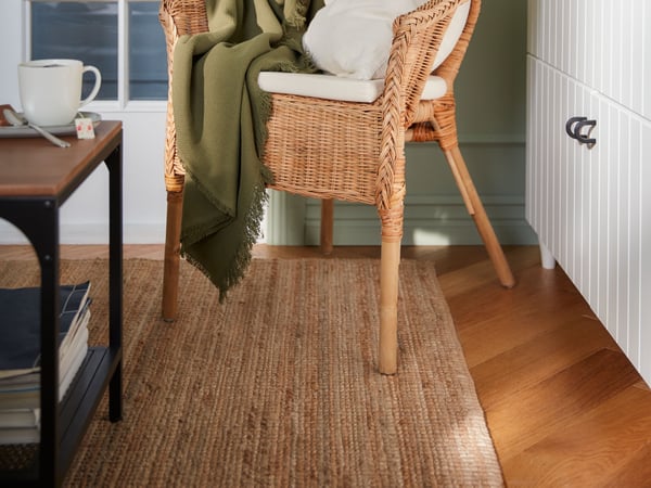 A Laila natural NORNA chair pad in the living room