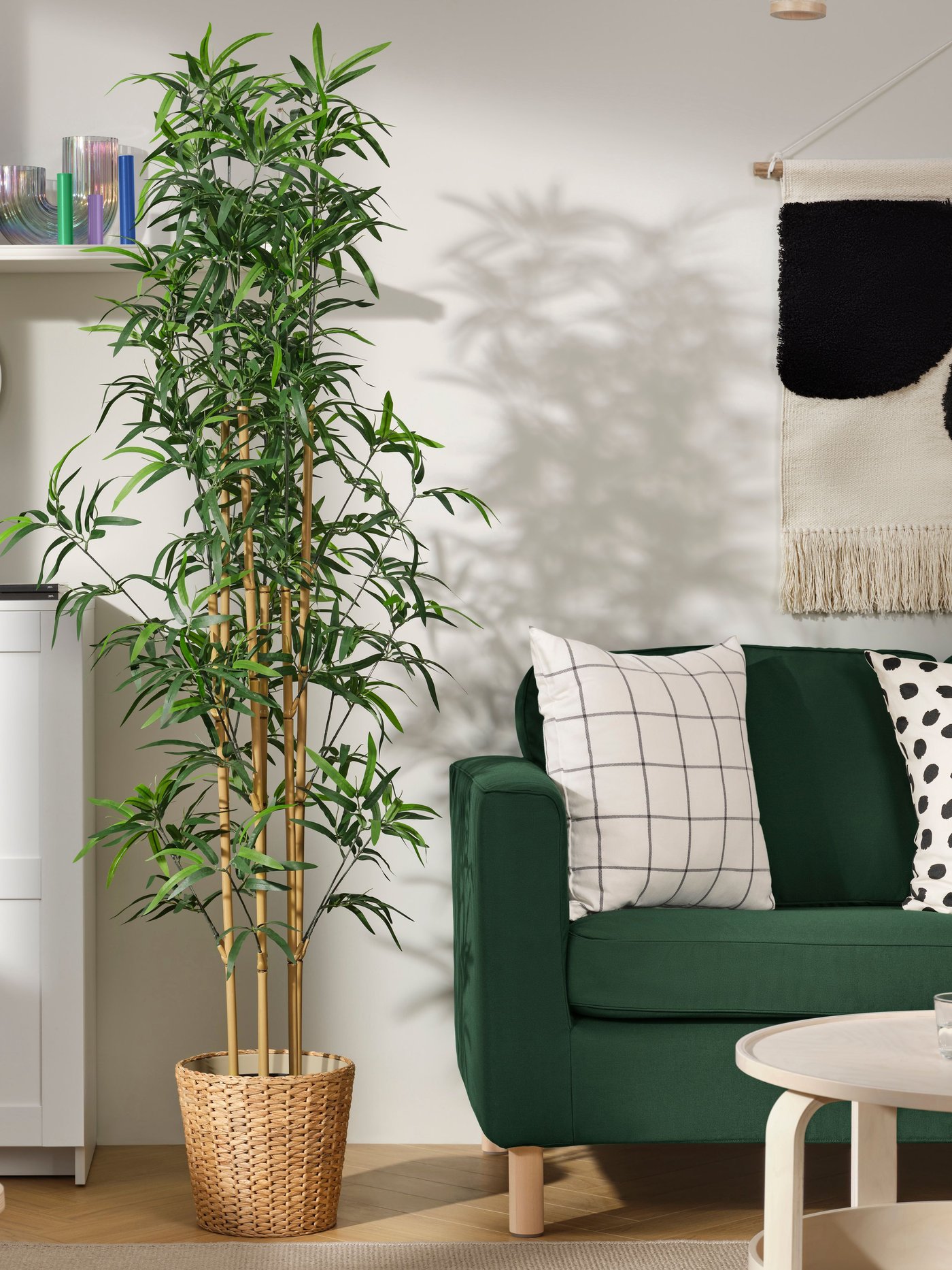 A FRIDFULL plant pot made of water hyacinth.