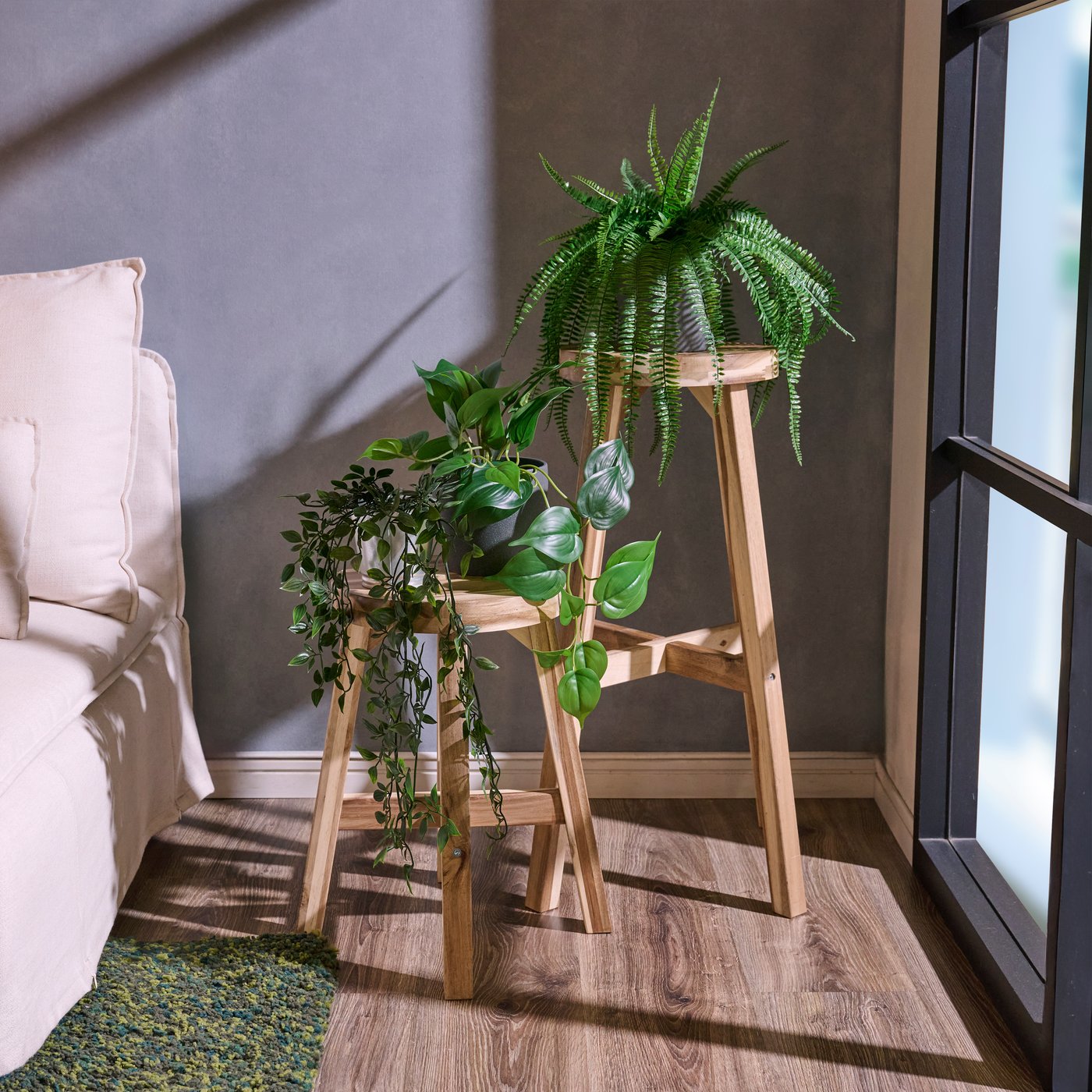 An acacia SKOGSTA bar stool