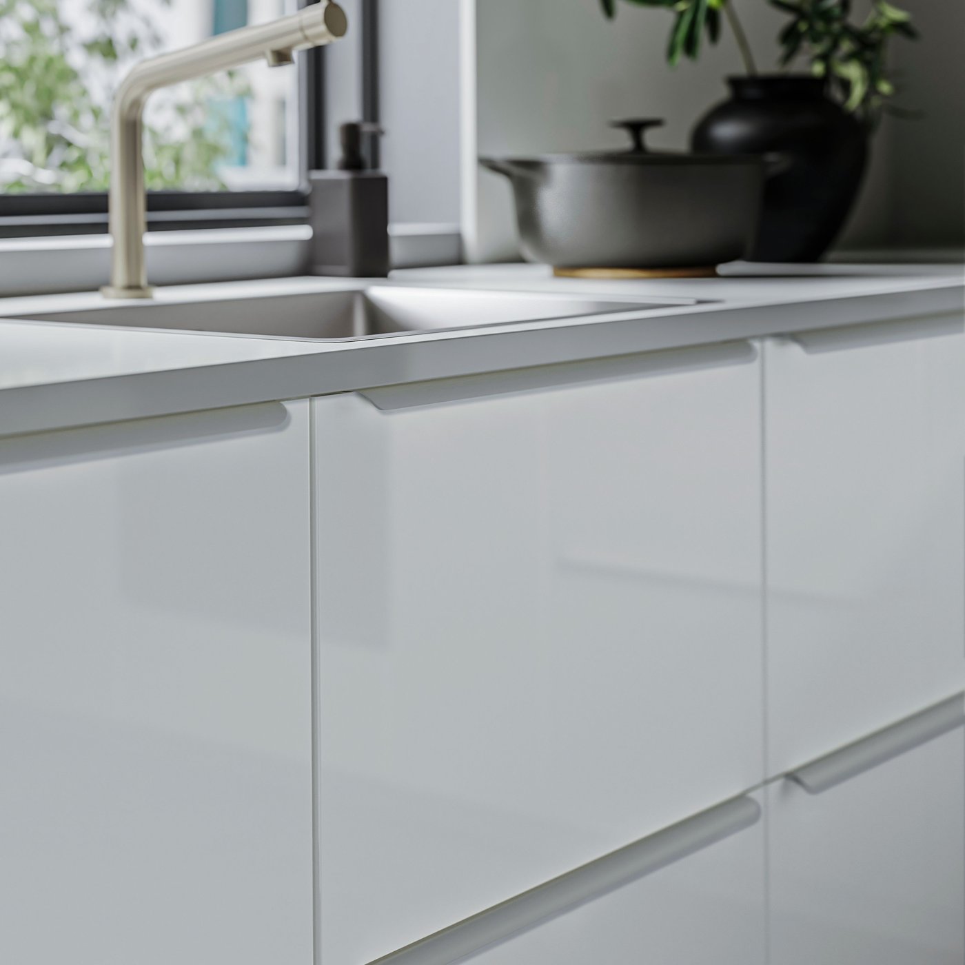 A custom-made grey EKBACKEN white high-gloss/laminate worktop.