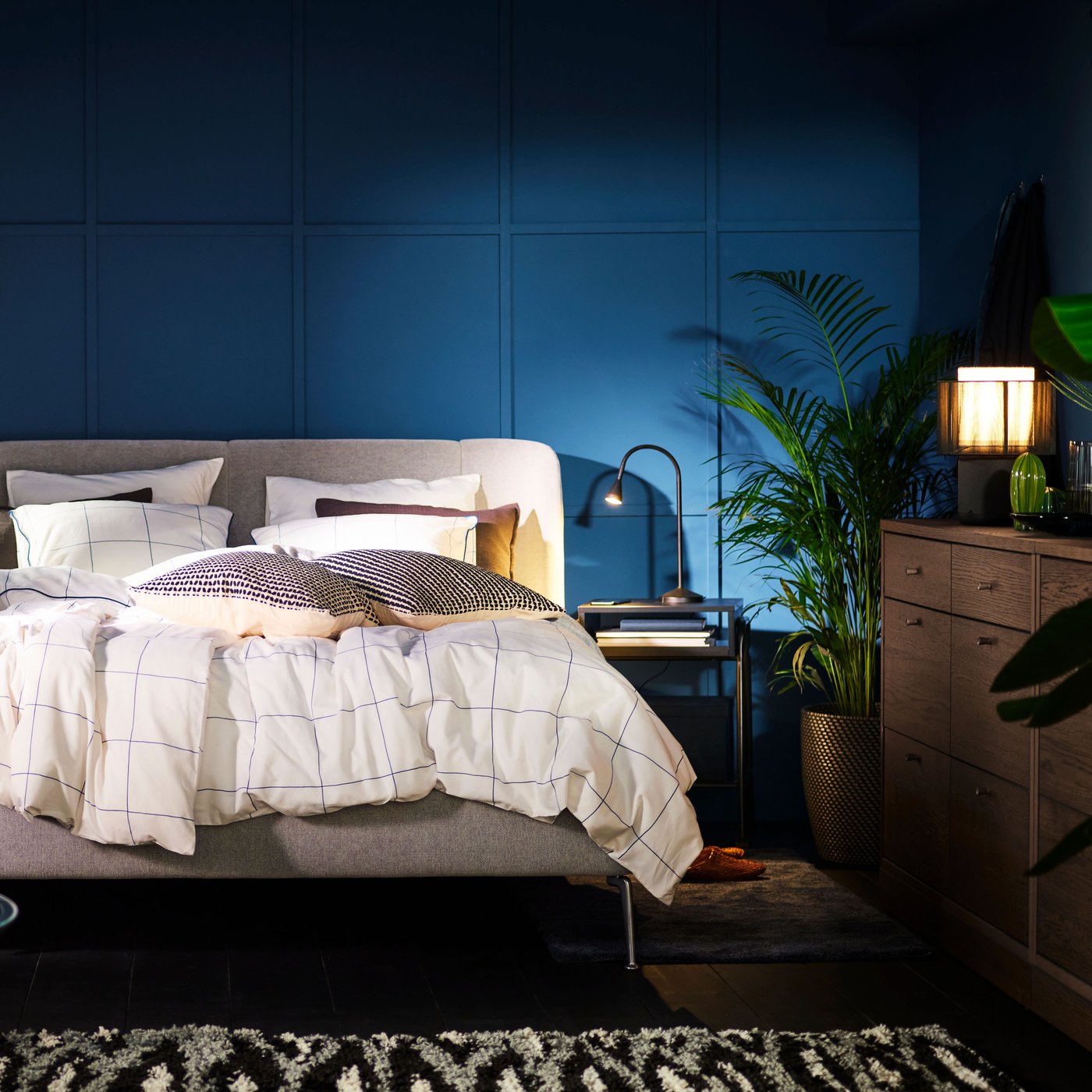 A Tallmyra white/black TUFJORD upholstered bed frame