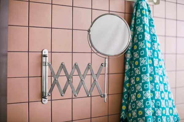A stainless steel FRÄCK mirror