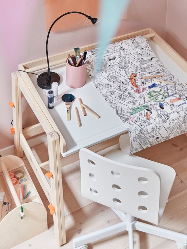A wood LUSTIGT arts and crafts storage in the childrens room