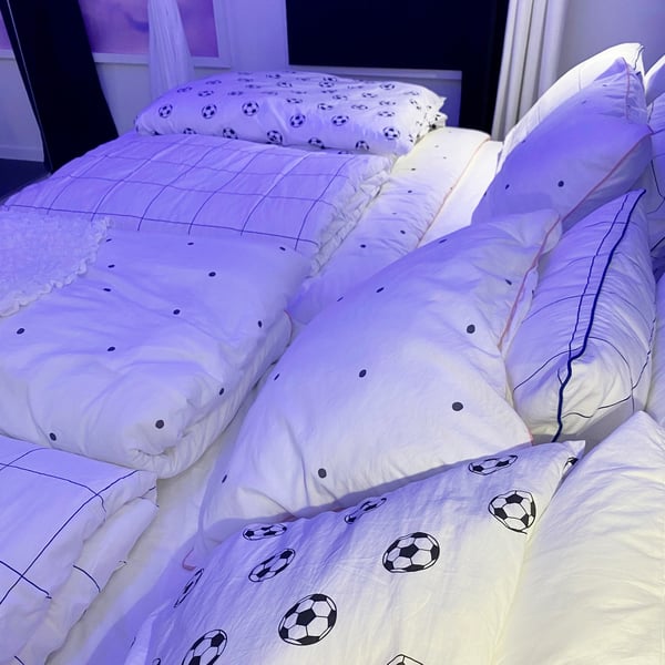 A white blue/check BREDVECKLARE duvet cover and pillowcase