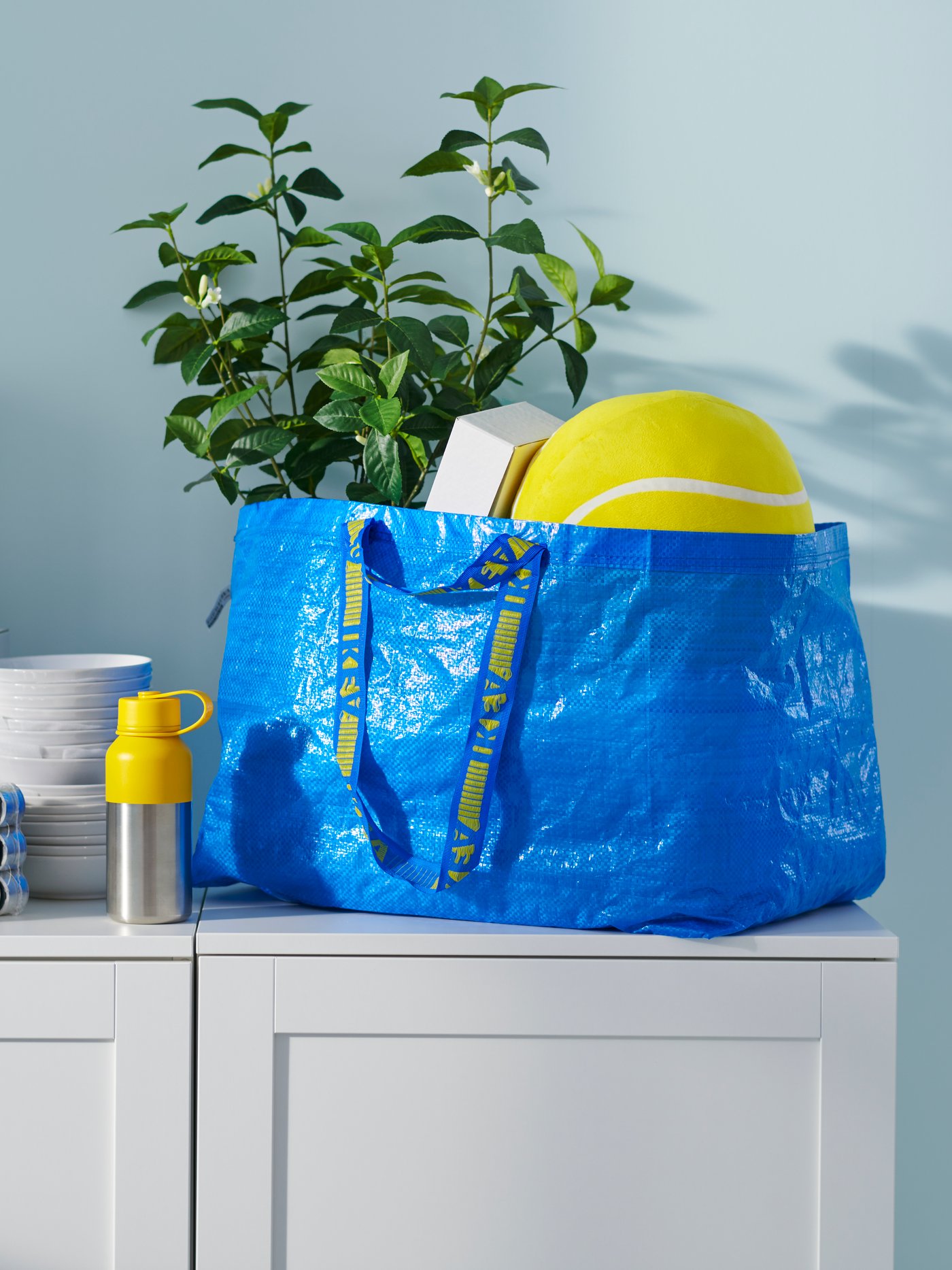 An IKEA FRAKTA bag filled with recently purchased products 