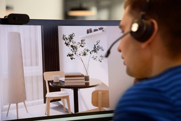 An IKEA employee in an online meeting with a customer.