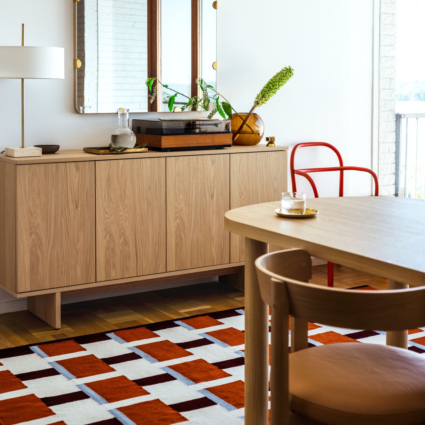 An oak veneer STOCKHOLM 2025 sideboard in the living room