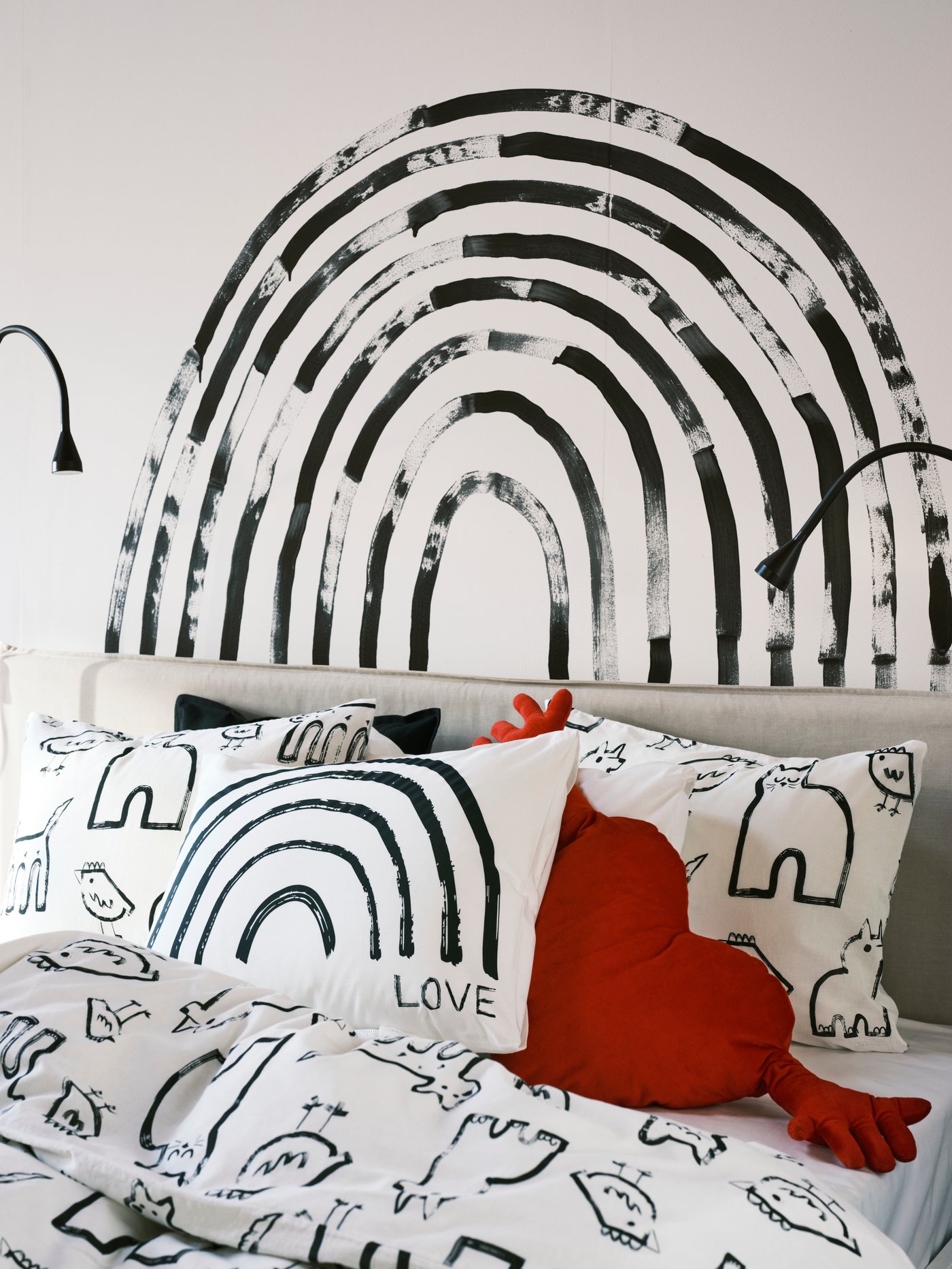 A white/rainbow TAPETMAL pillowcase
