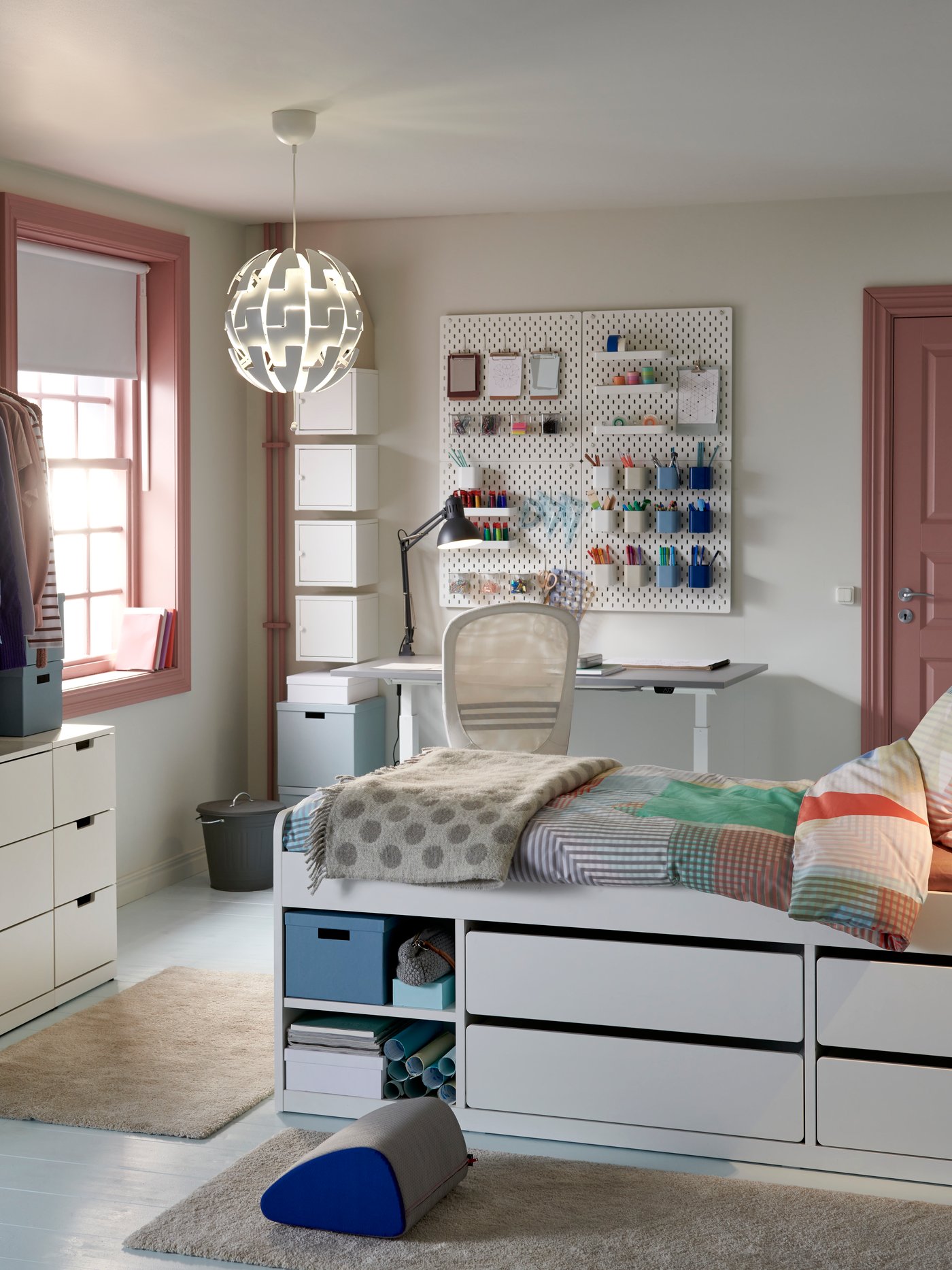 A white NORDLI chest of 3 drawers in the bedroom
