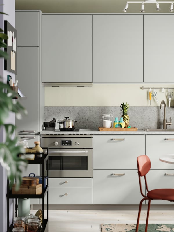 A light grey HAVSTORP door