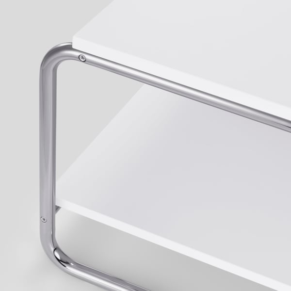 A white BAGGBODA side table in the NA