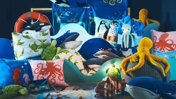 The BLÅVINGAD collection features soft toys and bed linens bursting with marine animals – turtles, penguins, and the majestic blue whale.