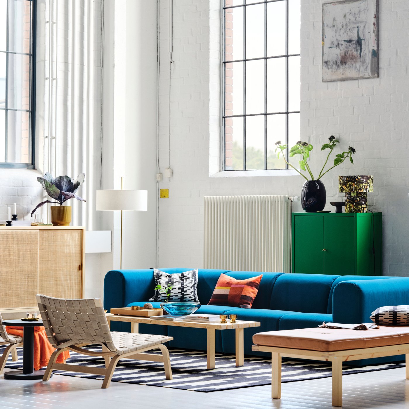 An Alhamn dark turquoise STOCKHOLM 2025 4-seat sofa in the living room