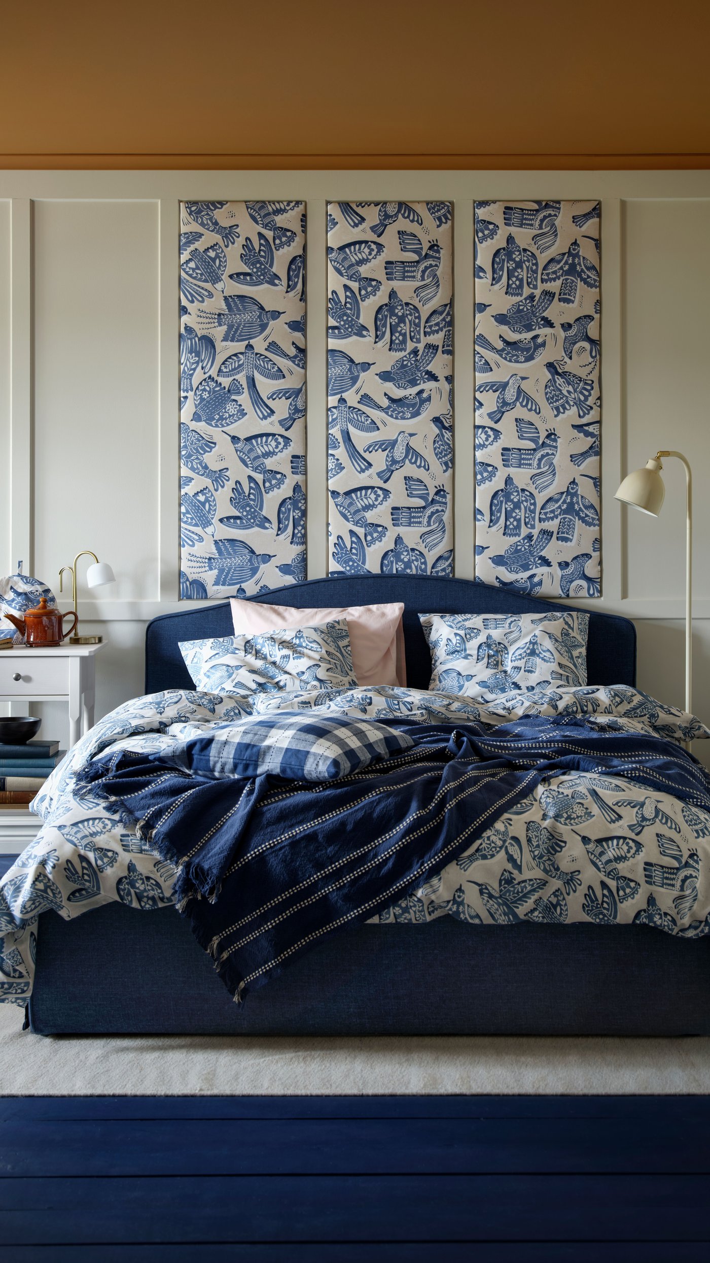 A beige/blue/bird pattern BITTERSÖTA pre-cut fabric in the bedroom