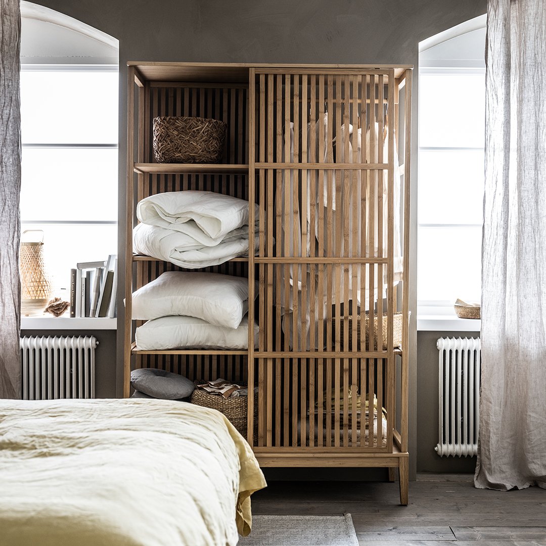 A bamboo NORDKISA open wardrobe with sliding door
