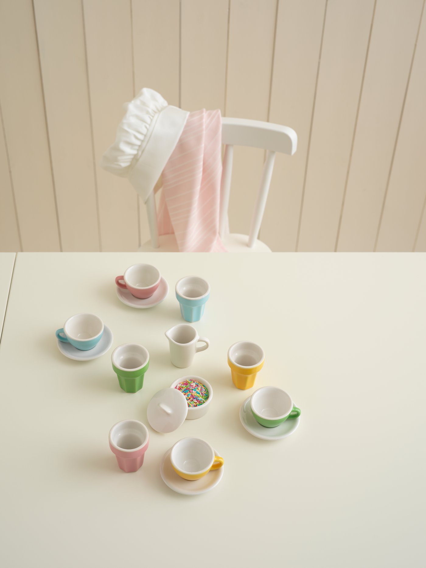 A multicolour DUKTIG 10-piece coffee/tea set in the childrens room