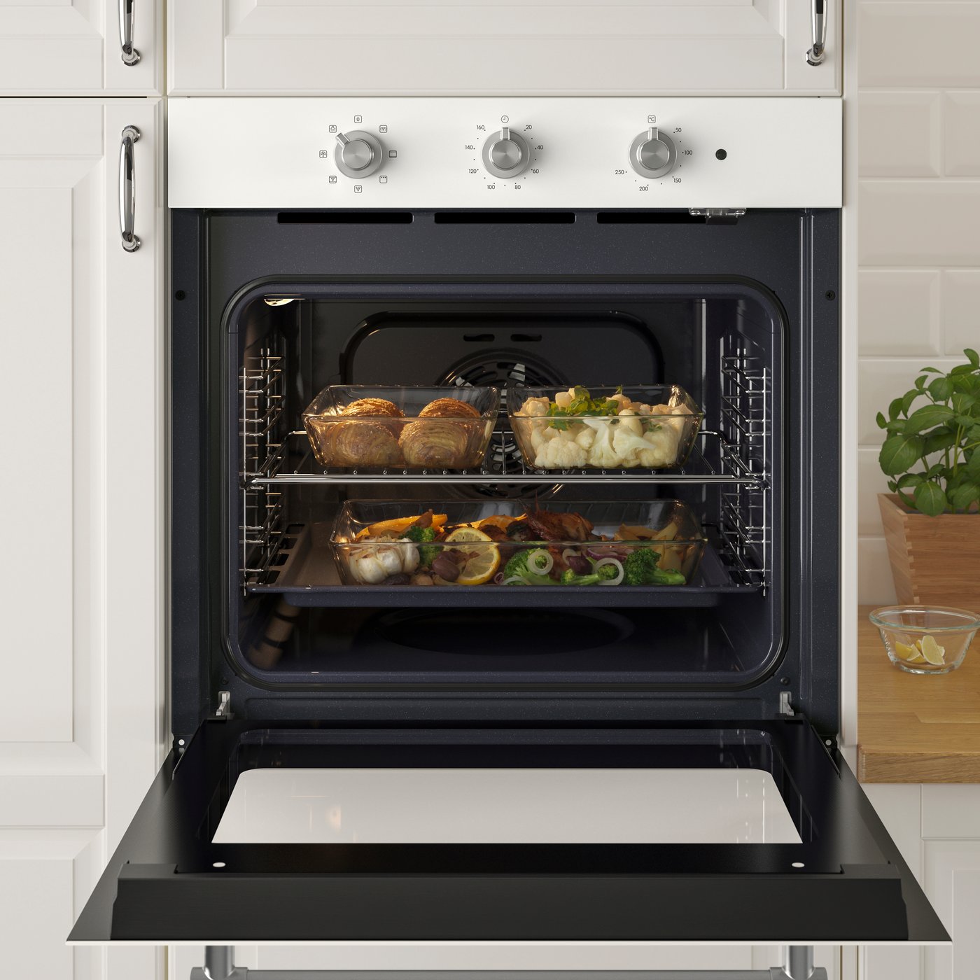 An IKEA 300 white MATTRADITION forced air oven in the kitchen