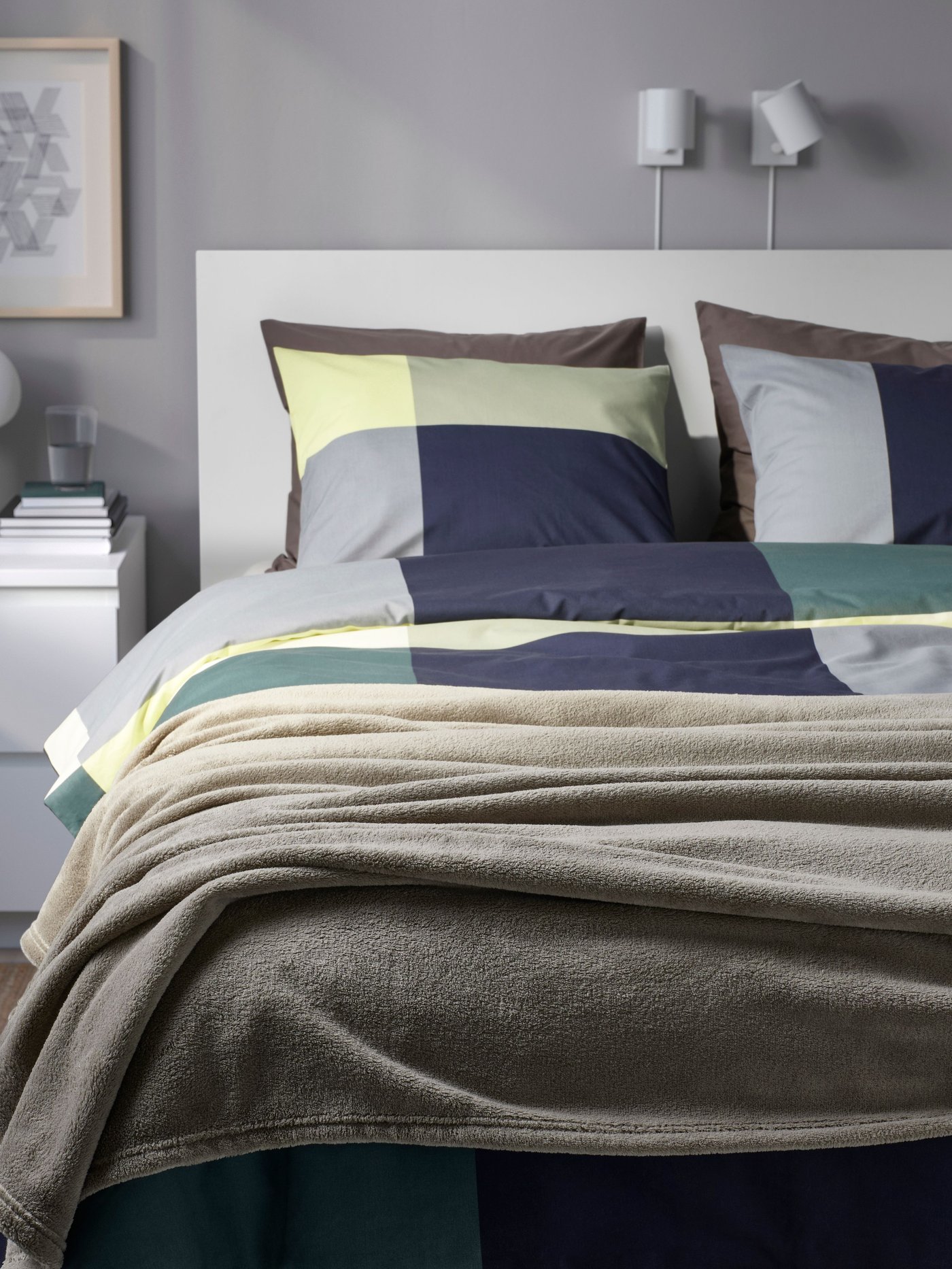 A light grey-green TRATTVIVA bedspread