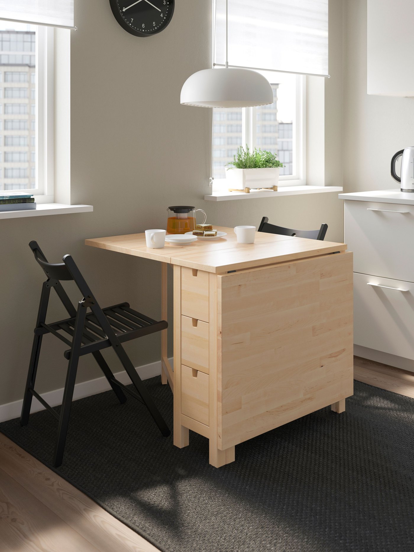 A white NYMÅNE pendant lamp